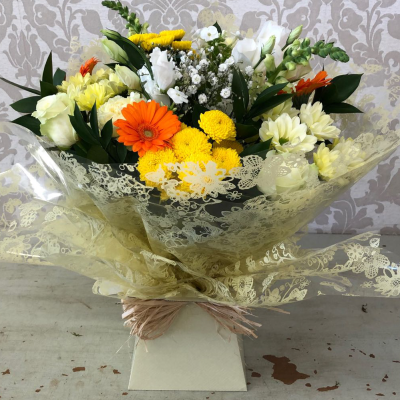 Sunshine Delight Bouquet - A bright and joyful bouquet with orange gerberas and yellow blooms, wrapped in lace-like material, perfect for brightening anyone's day.