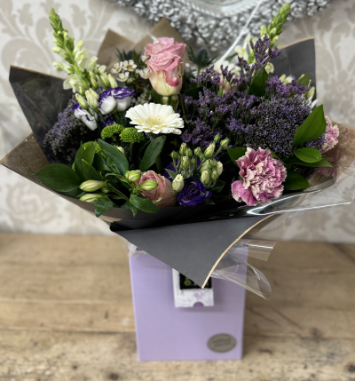 Lilac & Pink Hand Tied - A beautiful hand tied of lilac and pink fresh flowers, suitable for any occasion.